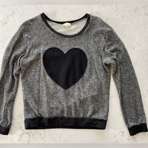 Women’s top with heart on the front